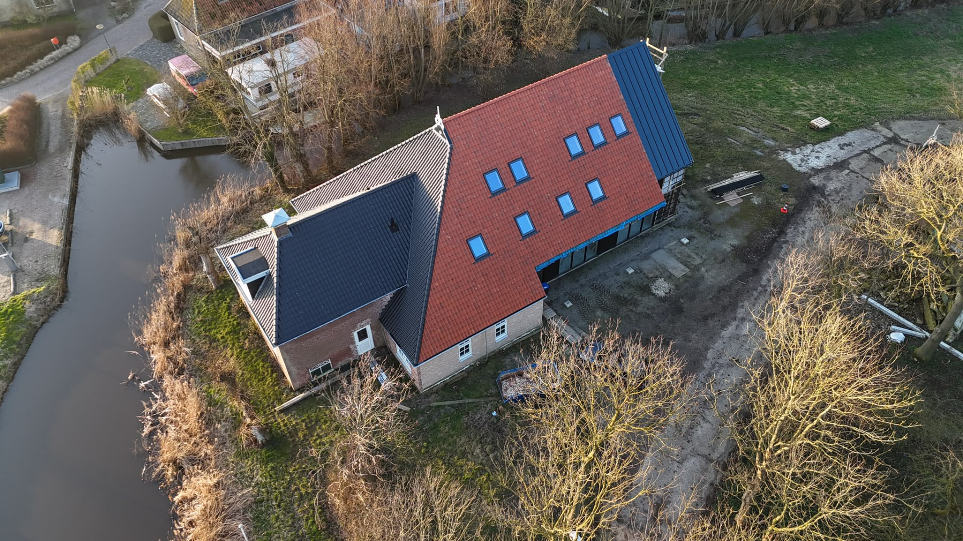 Complete dakvernieuwing — Hellend dak — pannen